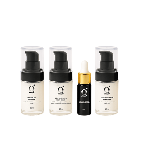 Set of skincare products with black and gold packaging on a white background for the ingrown hair kit